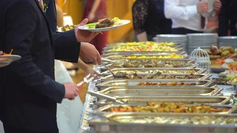 Buffet table: guests take food Stock Footage 88268420
