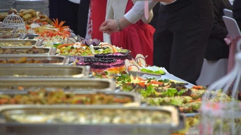 Buffet table: guests take food Video stock 88271243