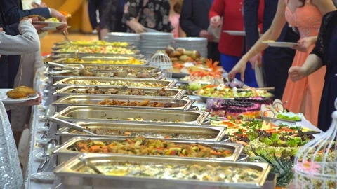 Buffet table: guests take food Stock Footage 88272596