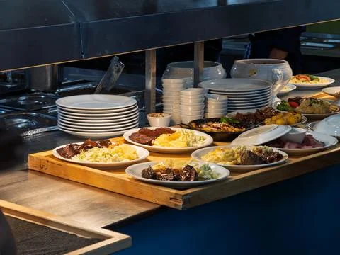 Buffet Table Loaded with Diverse Dishe by Professional Chefs Stock Photos