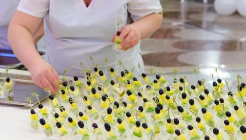 Buffet table making Stock Photos