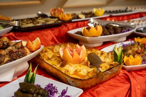 Buffet table presenting a wide array of food dishes for guests in a liveaboard Fotos de archivo