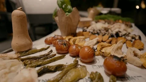 A buffet table at the reception of an event with a variety of cooked vegetables. Stock Footage 226729744