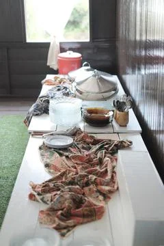 Buffet Table Setup with Dishes and Cutlery Stock Photos