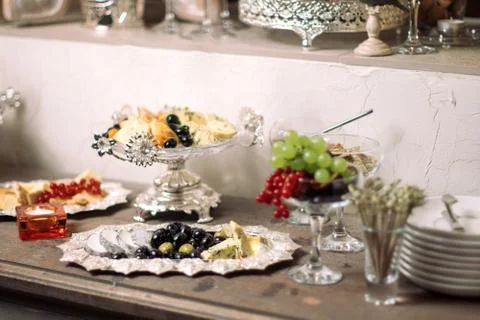 Buffet table, silver plate. Stock Photos