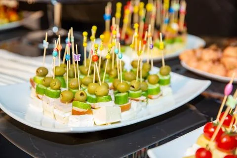 Buffet table with snacks for guests Stock Photos