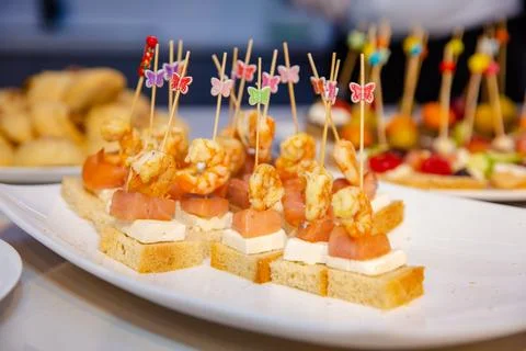 Buffet table with snacks for guests Stock Photos