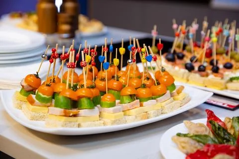 Buffet table with snacks for guests Stock Photos