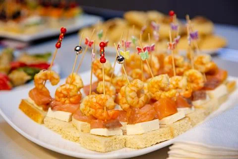 Buffet table with snacks for guests Stock Photos