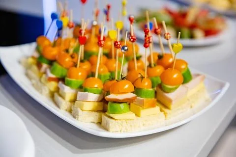 Buffet table with snacks for guests Stock Photos