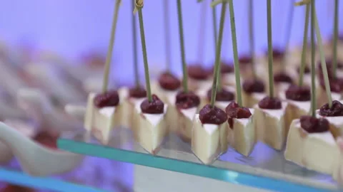 Buffet table with snacks on skewers Stockbeeldmateriaal 155940042