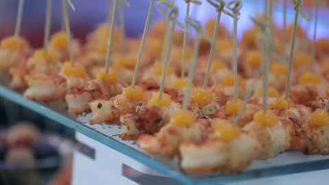 Buffet table with snacks on skewers Stockbeeldmateriaal 155940517