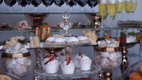 Buffet table, sweets, small cakes Stock Footage 127432198