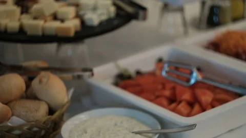 On the buffet table there are different snacks and vegetable dishes Stock Footage 74691630