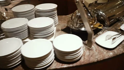 Buffet. Table with various food and plates for a set. Video stock 104314955