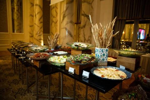 Buffet table with various salads and snacks Stock Photos