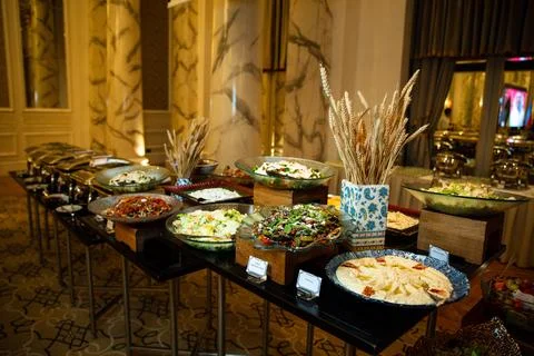 Buffet table with various salads and snacks Stock Photos