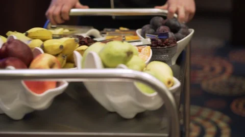Buffet table on wheels with different fresh fruits Stock Footage 129961926