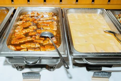 Buffet Trays with Pork and Cod in Different Sauces Fotos Stock