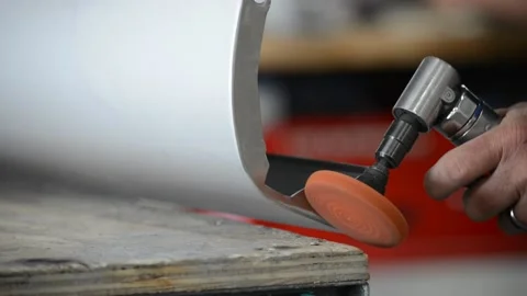 Buffing metal car part Stock Footage 156468712