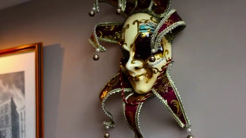 The buffon mask on the wall Stock Footage 74420866