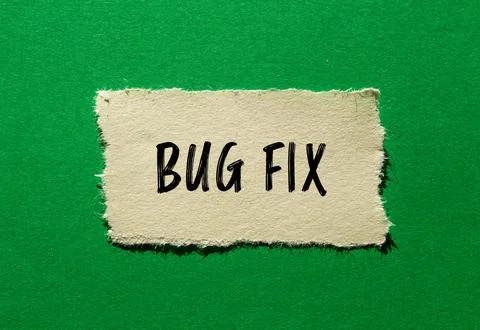 Bug fix words written on ripped paper with green background. Conceptual bug f Stock Photos