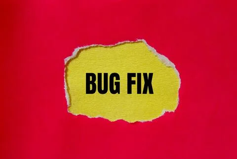 Bug fix words written on ripped red paper with yellow background. Conceptual  Foto stock