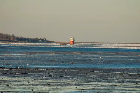 Bug Light across mudflats Stock Photos