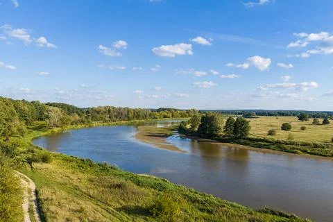 Bug River flowing through green natural landscape in Drohiczyn Stock Photos