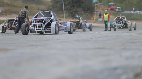 Buggies are at the start before the arrival Stock Footage 54642421