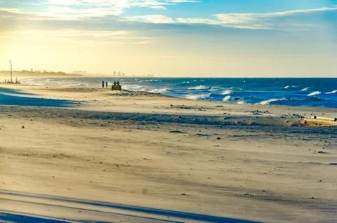 Buggy on the beach at the sunset Stock Photos