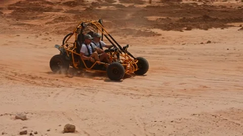 Buggy rushing through the desert Stock Footage 49403854