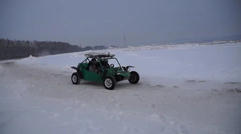 Buggy on a snowy road Stock Footage 62021828