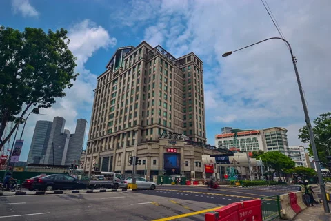 Bugis Junction traffic cars clouds Stock Footage 140828566