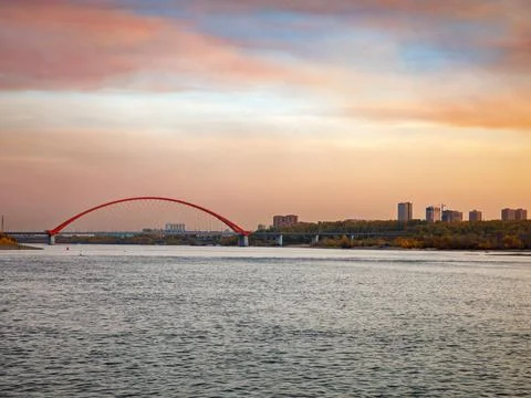 Bugrinsky Bridge over River Ob in big city Novosibirsk, Russia, sunrise or Stock Photos