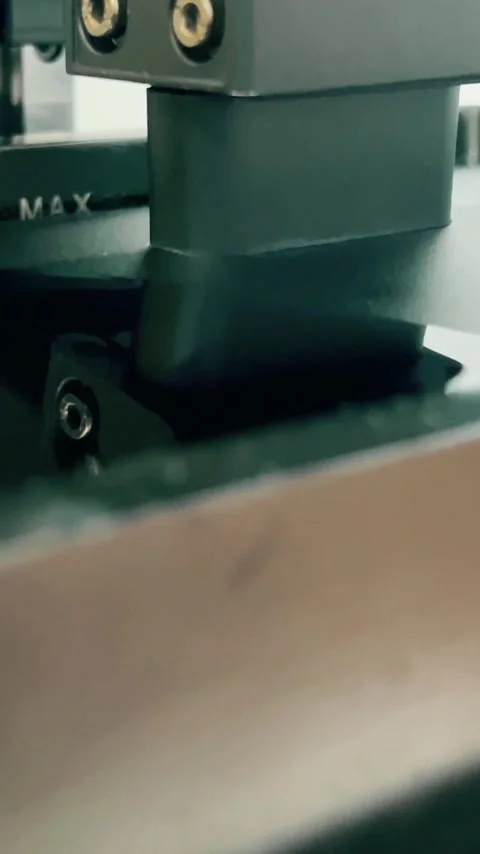 Build platform of the SLA 3D printer dips into liquid photosensitive resin for Stock Footage 323461461