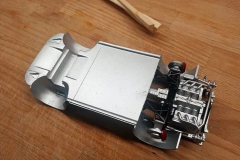 Build a scale model of the car. Modeling. The engine, gearbox and suspension  Stock Photos