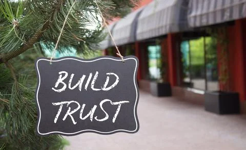 Build trust symbol. Build trust on chalk blackboard. Beautiful background w.. Stock Photos