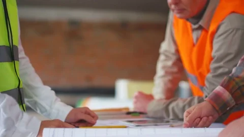 Builder and customer at the construction site Video stock 74187105