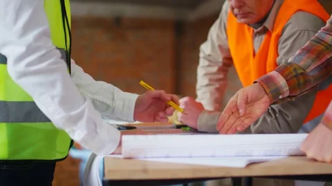 Builder and customer at the construction site Stock Footage 74188219
