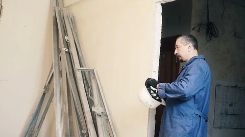 Builder and Manager checking colleagues work Stock Footage 99778503