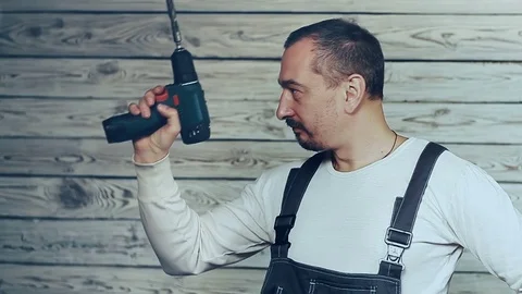 Builder and screwdriver Video stock 83236026