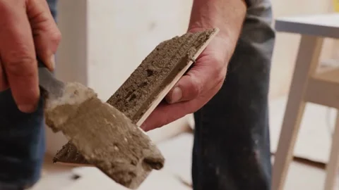 Builder applies tile glue Video stock 148736683