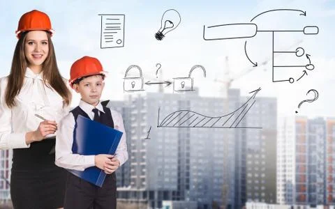 Builder boy in the orange helmet Stock Photos