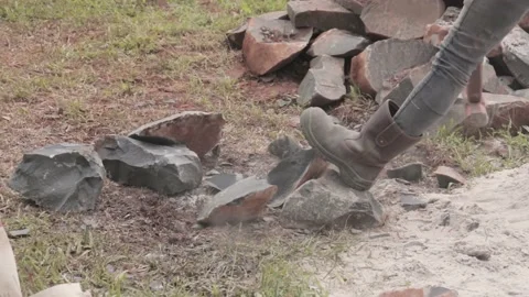 A builder breaks the foundation stone Stock Footage 207481919