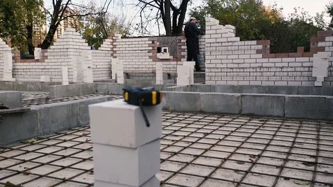 Builder bricklayer puts bricks into the wall. 스톡 동영상 117658507