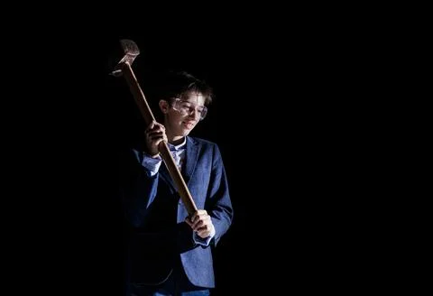 Builder child with a sledgehammer Stock Photos