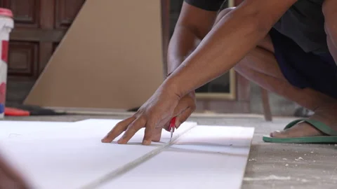 The builder cut by knife in construction. Stock Footage 299964133