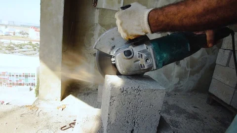 Builder cuts stone, angle grinder. Construction work. Anapa, Krasnodar region 28 Vídeos de archivo 93586743