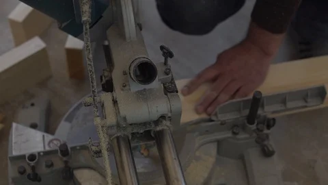 Builder cuts a tree, a lot of sawdust Stock Footage 129108232